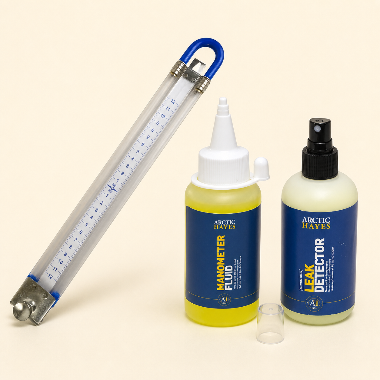 Arctic Hayes U-Flex manometer, manometer fluid and non-aerosol leak detector in the TomKat tightness-testing bundle.